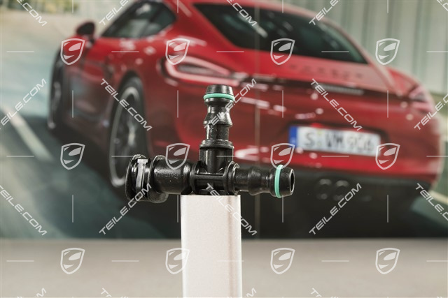 Trójnik systemu spryskiwaczy reflektorów