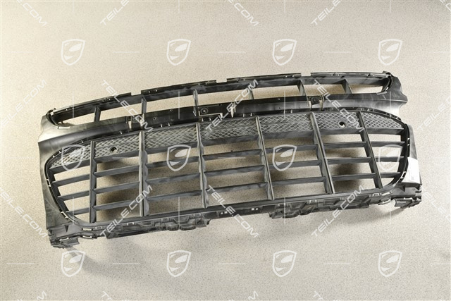 Kratka środkowa przedniego zderzaka z otworami na czujniki parkowania, Czarna