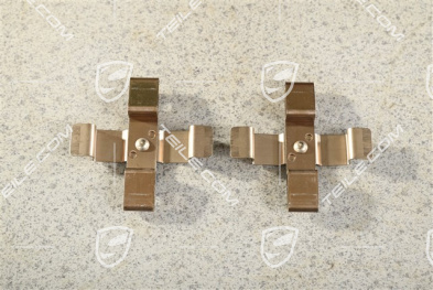 Front axle fixed caliper spring, brake pad mouting